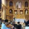 Niños tocando sus instrumentos dentro de una iglesia en Santa Ana de Velasco durante el festival de música barroca de 2025.