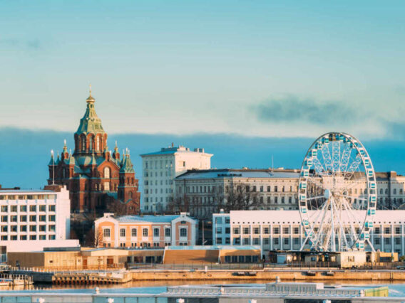 Helsinki, Finland. View Of Uspenski Cathedral On Hill And Ferris Wheel At Winter Day. Eastern Orthodox Cathedral Dedicated To Dormition Of The Theotokos Virgin Mary.